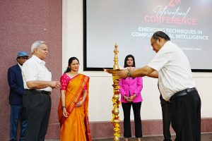 Dr. Yajulu Medury, Vice Chancellor of Mahindra University, Dr. Arya Kumar Bhattacharya, Dean of Research, Ecole Centrale School of Engineering, Mahindra University and Christina Abraham, Head of Digital for Corporate and Analytics at Airbus India lighting the lamp at the Fourth International Conference on Emerging Techniques in Computational Intelligence (ICETCI 2024)